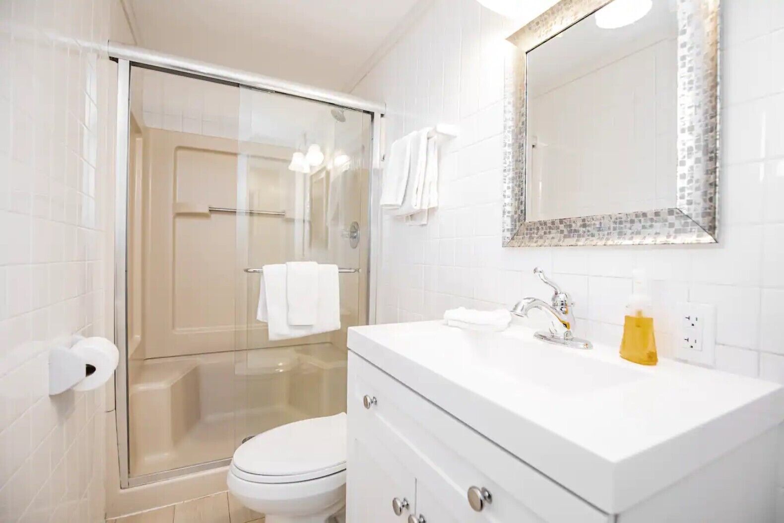 Shower, hair dryer, towels, soap