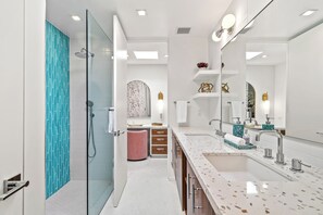 Shower, hair dryer, towels, soap