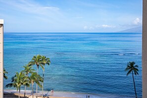 On the beach, sun loungers, beach towels