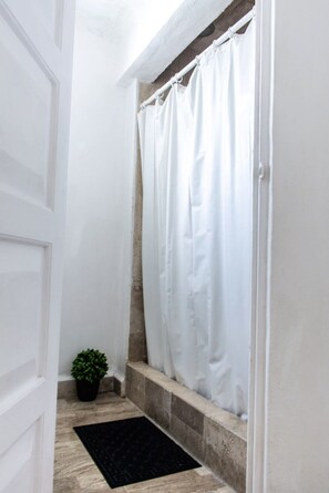 Shower, towels, soap, shampoo