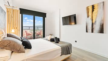 Tabla de planchar con plancha, wifi gratis, ropa de cama