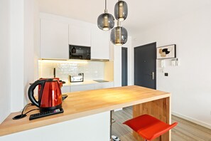 Fridge, microwave, coffee/tea maker, electric kettle