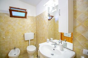 Regadera, secadora de cabello, bidet