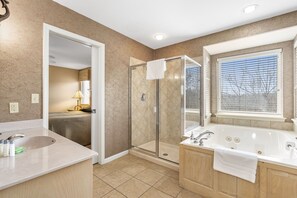 Shower, jetted tub, hair dryer, towels