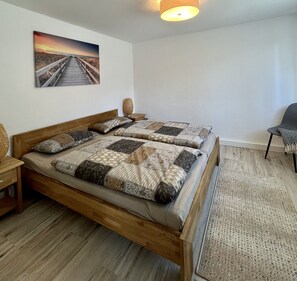 4 bedrooms, desk, iron/ironing board, travel cot