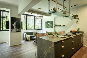 50-inch Smart TV with cable channels, TV - Sophisticated Tel Aviv Retreat 1BR Apt (Tel Aviv)