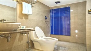 A modern bathroom with a large sink, toilet, and shower. - MeroStay204Satkar hotel (Kathmandu)
