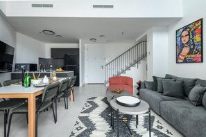 55-inch Smart TV with cable channels, TV - Experience 3BR High-Floor Duplex (Tel Aviv)