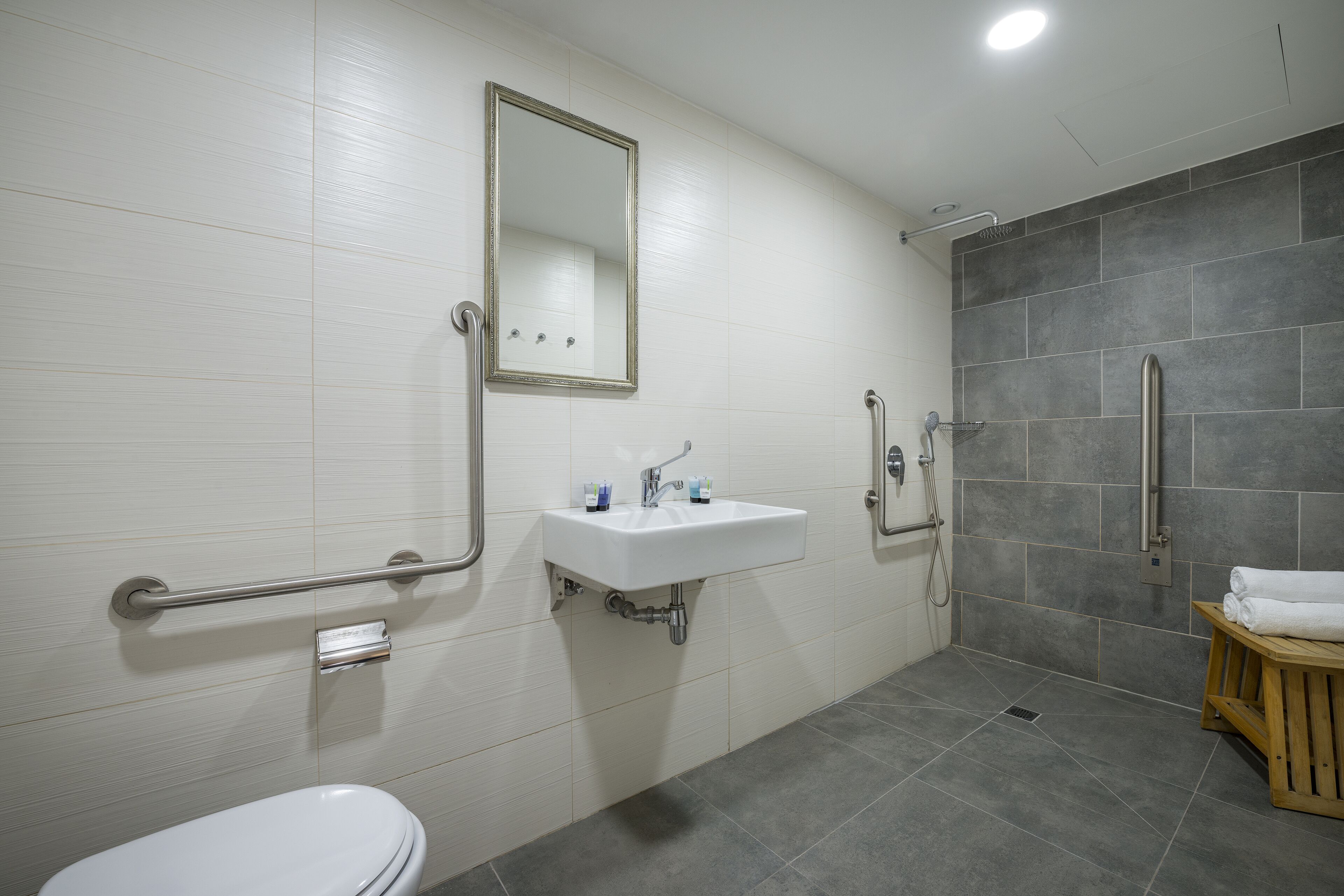 Family Quadruple Room | Bathroom | Shower, hair dryer, towels, soap