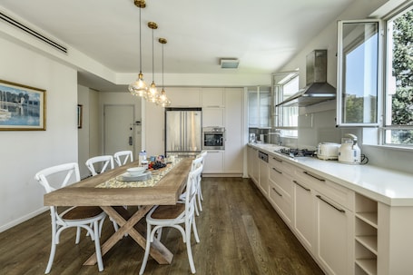 Apartment | Private kitchen | Full-size fridge, microwave, oven, stovetop