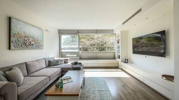 65-inch Smart TV with cable channels, TV