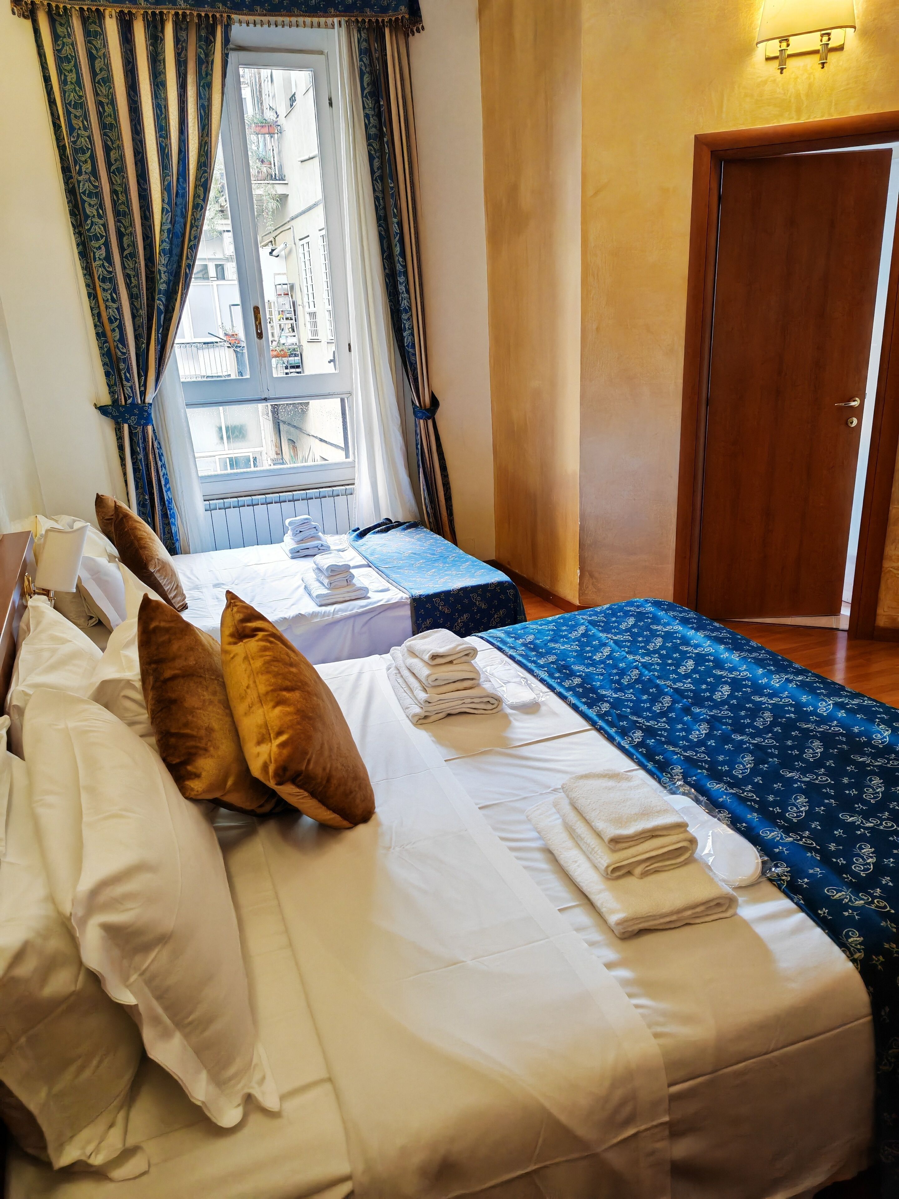 Executive Quadruple Room | Premium bedding, down comforters, minibar, in-room safe