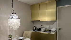 Superior Apartment | Living area | 32-inch LED TV with digital channels, TV - Espana Resort Pattaya Jomtien Beach (Pattaya)