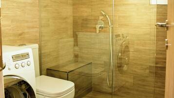 Shower, hair dryer, towels, soap