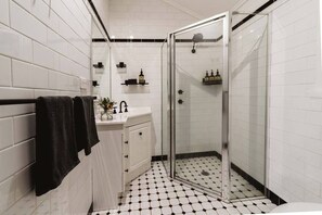 Bathtub, hair dryer, shampoo
