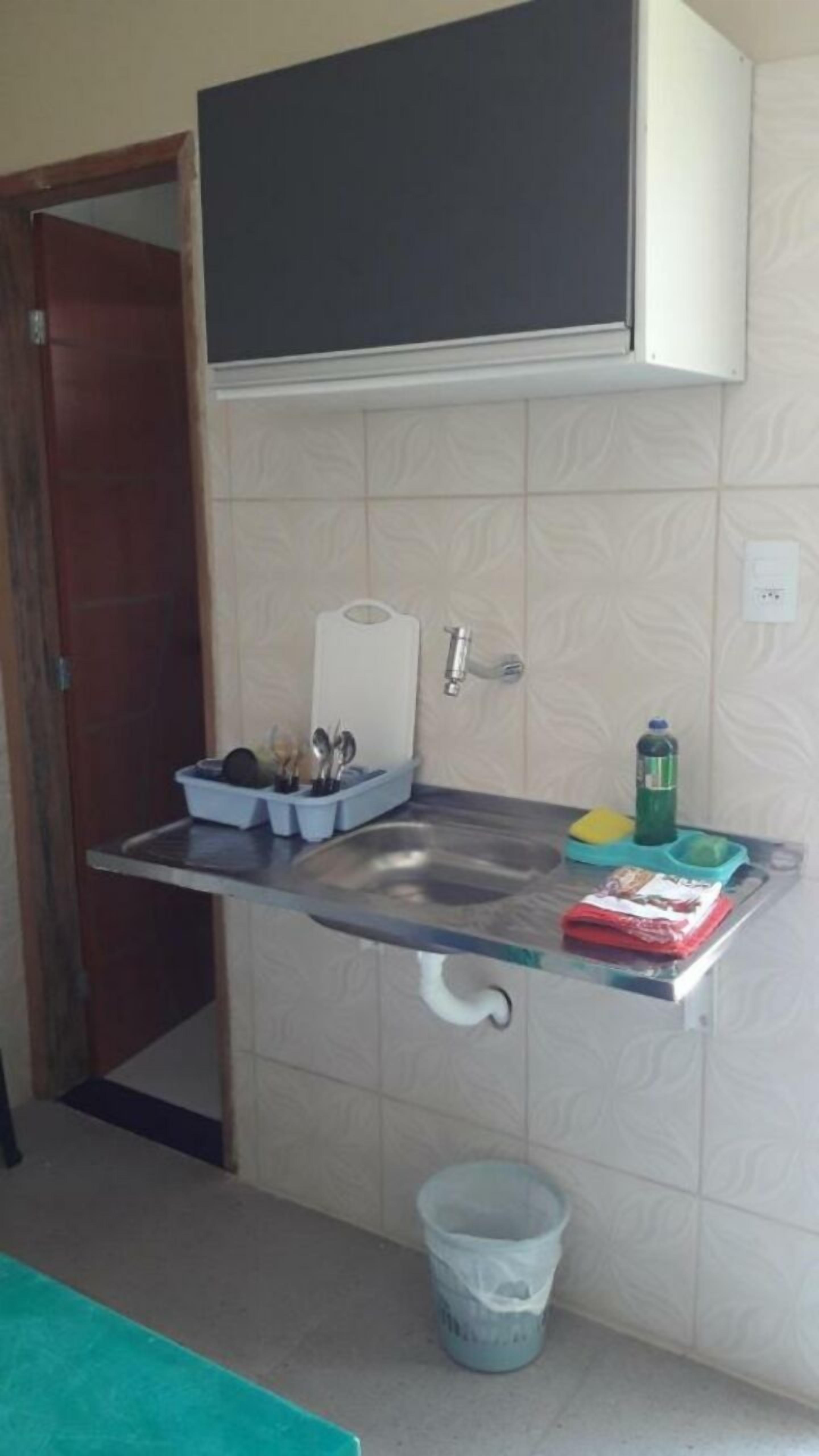 Economy Triple Room | Private kitchen | Cleaning supplies