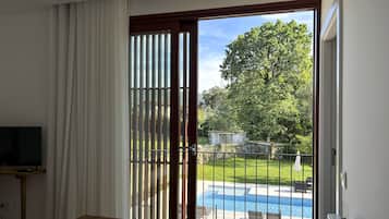 Habitación doble superior, vistas a la piscina | Vistas desde la habitación