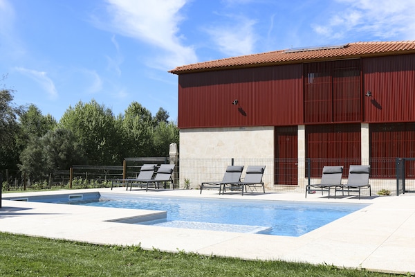 Outdoor pool, pool umbrellas, sun loungers