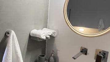 Hair dryer, bidet, towels, soap