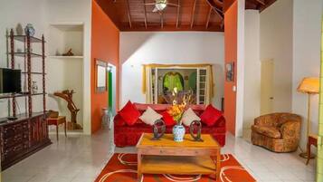 Family Villa | Living area | Flat-screen TV