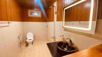 Deluxe Double Room | Bathroom | Shower, designer toiletries, towels, soap