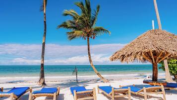 On the beach, white sand, windsurfing, beach bar