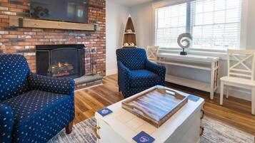 Smart TV, fireplace, books