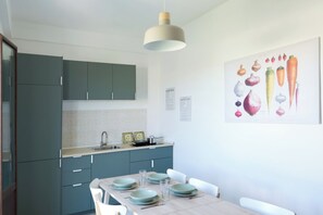 Apartment | Private kitchen | Full-sized fridge, stovetop, espresso maker, coffee/tea maker - Le Stanze di Archimede (Syracuse)