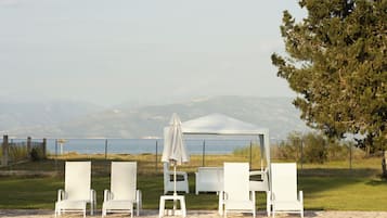 Seasonal outdoor pool, pool umbrellas, sun loungers