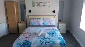 Comfort Room, 1 Bedroom, Ensuite, City View (Family Room 1st Floor ) | Blackout drapes, soundproofing, iron/ironing board, WiFi (free)