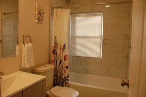 Hair dryer, towels, soap, shampoo