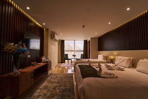 Habitación familiar, vistas a la montaña | Minibar, sistema de insonorización, wifi gratis y ropa de cama