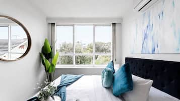 1 bedroom, desk, iron/ironing board, travel cot