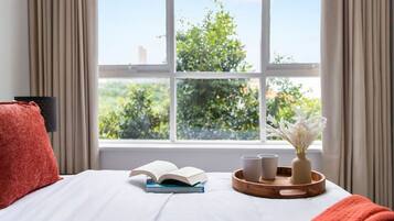 2 bedrooms, desk, iron/ironing board, travel crib