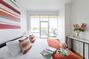 1 bedroom, desk, iron/ironing board, travel cot