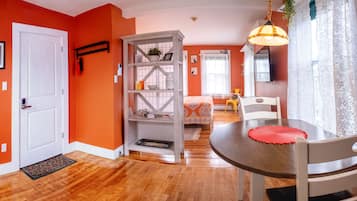 City Apartment, 1 Queen Bed | Living area | Flat-screen TV