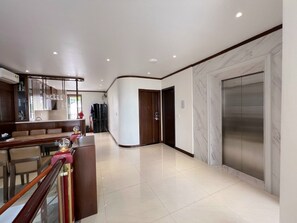 Family Apartment | Living area | 32-inch Smart TV with digital channels, TV