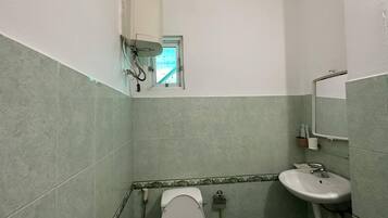 Family Room | Bathroom | Shower, slippers, towels, toilet paper