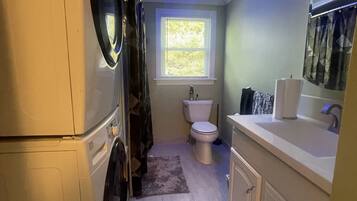 Hair dryer, towels, soap, toilet paper