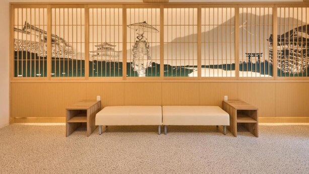 A room with a wooden shoji screen, a bench, and a view of traditional Japanese architecture. - Waka Kyoto Kawaramachi (Kyoto)