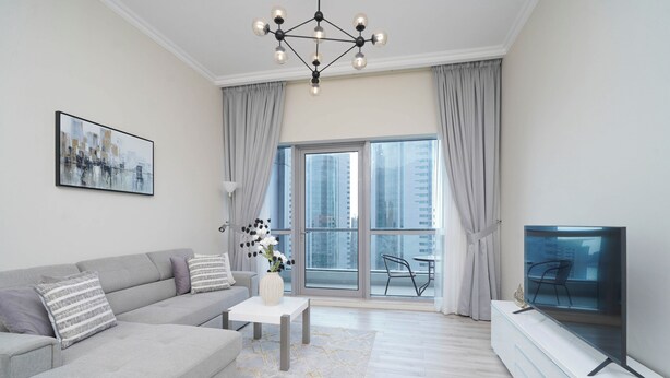 Deluxe Apartment | Living area | 55-inch Smart TV with cable channels, TV - Chic Marina View Living in a Two Bedroom (Dubai)