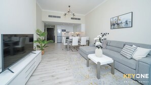 Deluxe Apartment | Living area | 55-inch Smart TV with cable channels, TV - Chic Marina View Living in a Two Bedroom (Dubai)