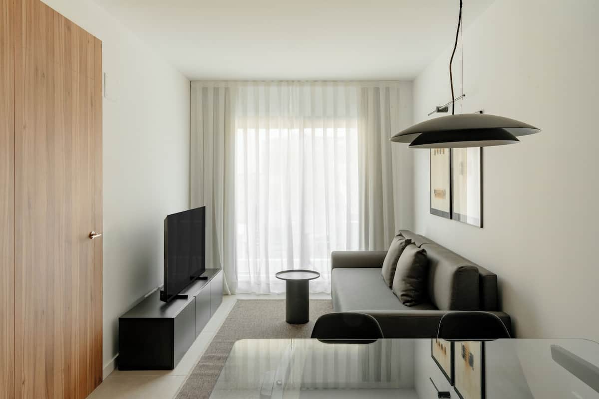 Superior Apartment, 1 Bedroom, Balcony, Courtyard View | 2 bedrooms, premium bedding, in-room safe, blackout drapes