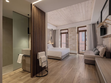Superior Suite with balcony | In-room safe, blackout drapes, soundproofing, iron/ironing board