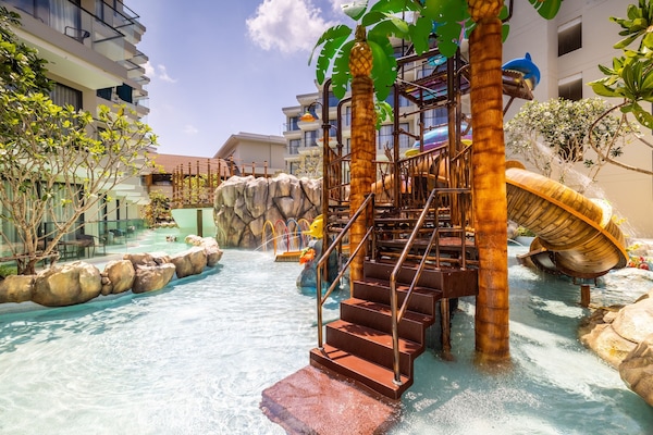 2 outdoor pools, open 7:00 AM to 7:00 PM, pool umbrellas, sun loungers