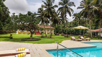 Outdoor pool, open 8:00 AM to 8:00 PM, pool umbrellas, pool loungers