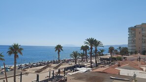 On the beach, beach towels