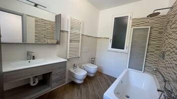 Superior Double Room | Bathroom | Hair dryer, bidet, towels, soap