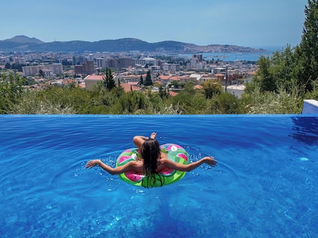 Seasonal outdoor pool. Uphill Glavanovic Pool Villa