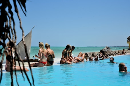 Outdoor pool, pool umbrellas, sun loungers